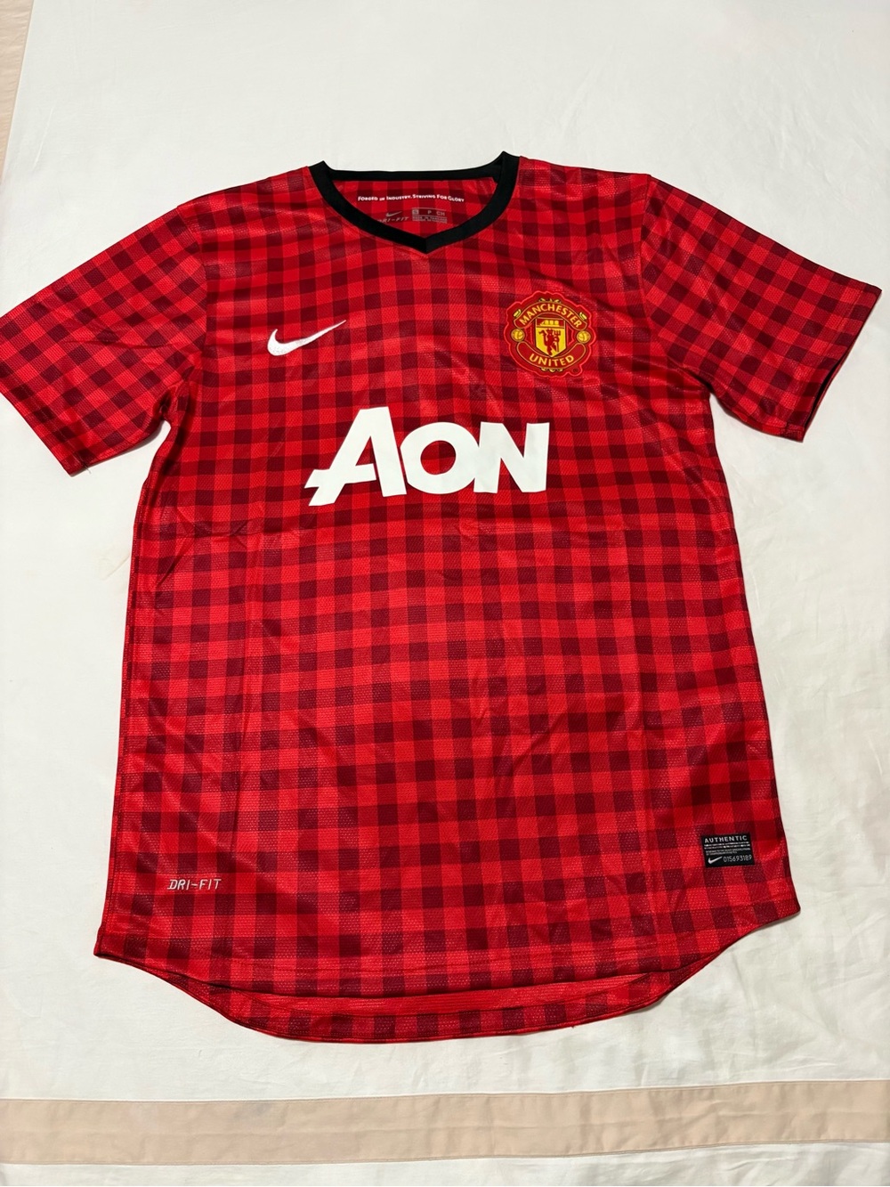 Nike Red and Black Checkered Football Jersey with White AON Logo